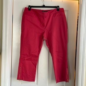 Pink cropped/capri pants with cute gold detail.